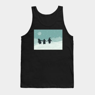 Penguin family walking in the moonlit snow Tank Top